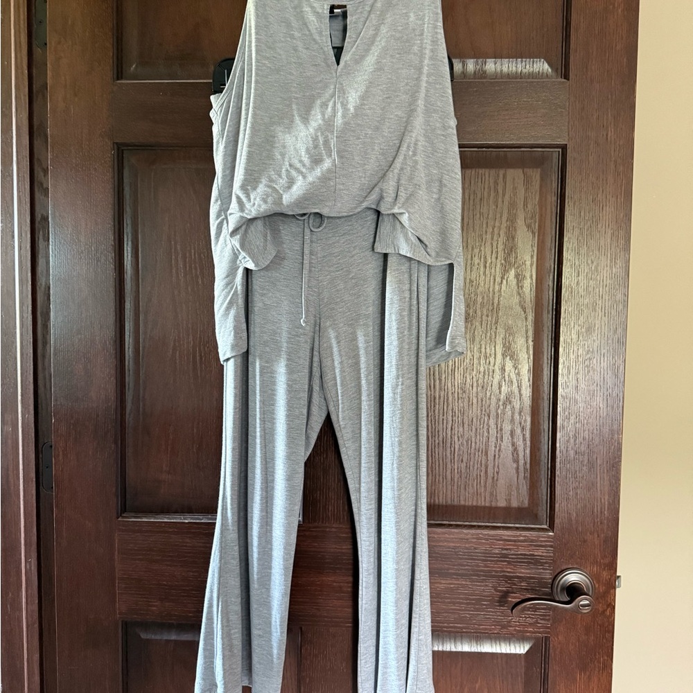 cabi Gray jumpsuit crop pant legs with pockets.